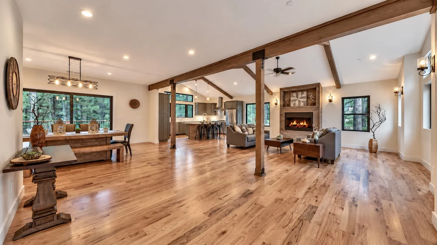 Open living and dining area with the kitchen beyond